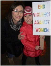 Beth Farhat with a young supporter