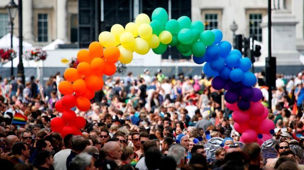 Rainbow balloons at a march