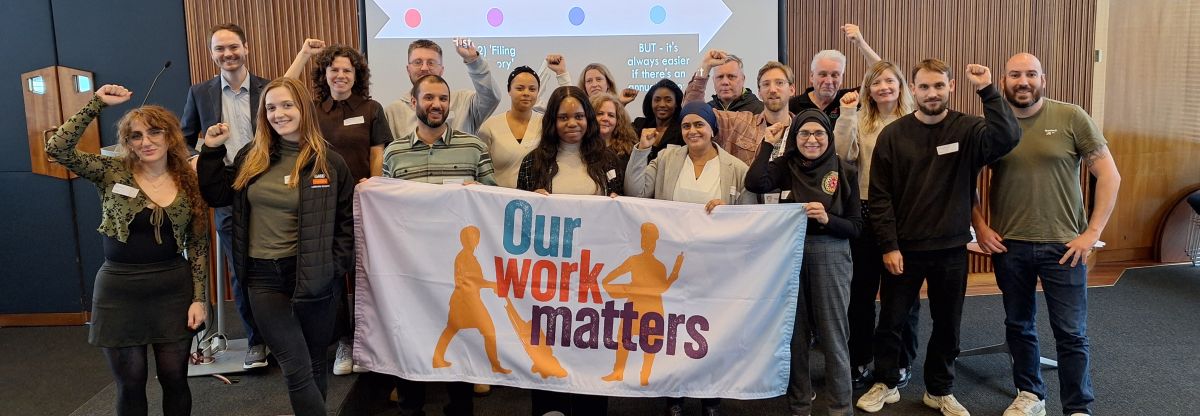 Officer and activists at Our Work Matters training event