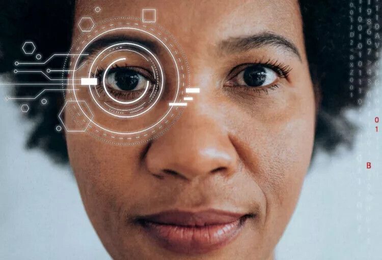 Woman of colour reading data