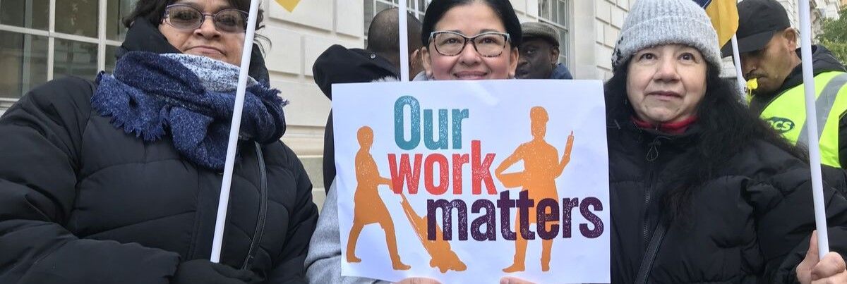 PCS picket line with 'Our Work Matters' campaign placard