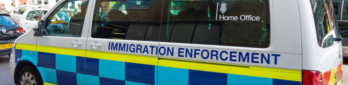 An editorial stock photo of an Immigration Enforcement van driving through central London in the United Kingdom