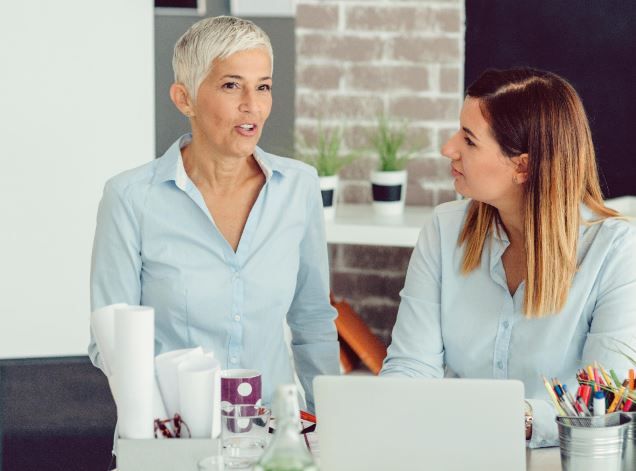 Two women talking
