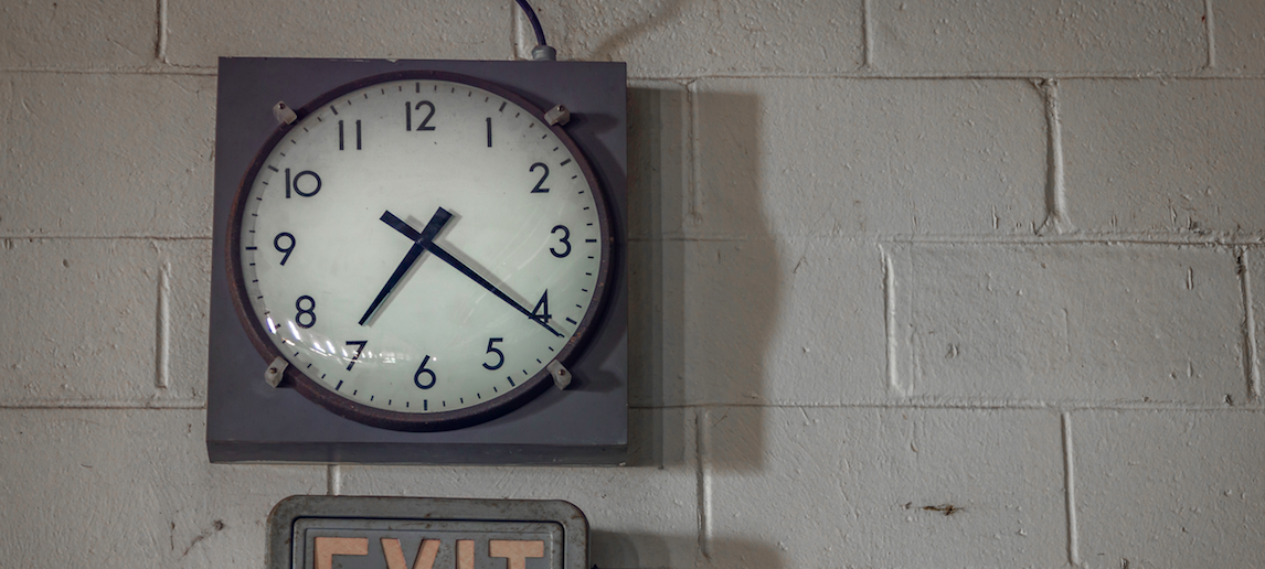 Clock on a block wall