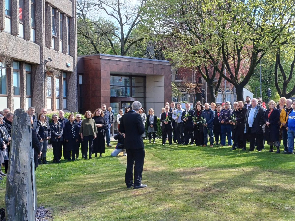 Welsh workers remember their colleagues who were killed at work while the UK government plans to remove British laws which make workplaces safe