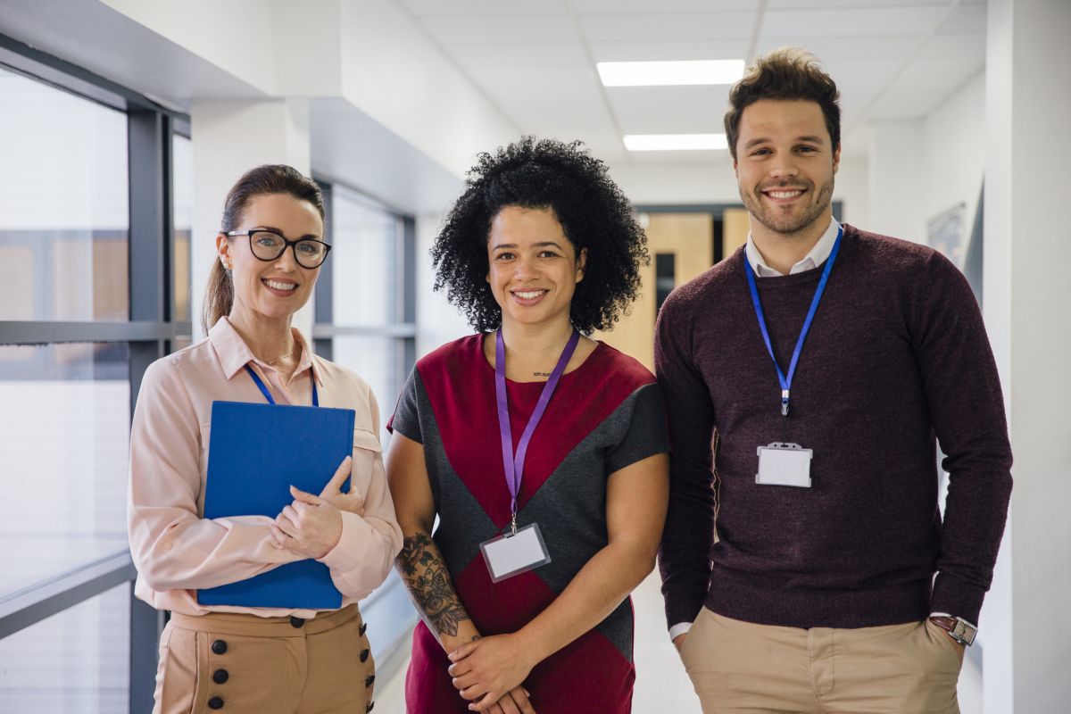 Teachers in the hallway of a school