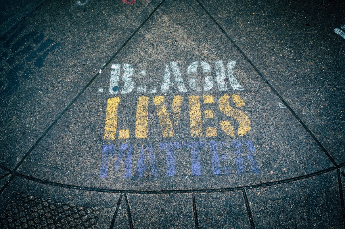 Black Lives Matter stencil on pavement