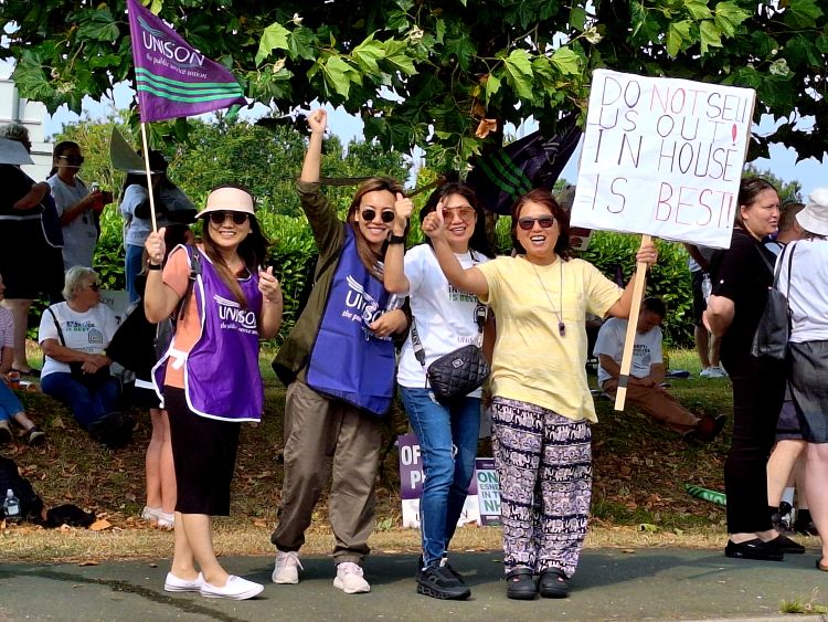 NHS workers on picket line to fight outsourcing theats