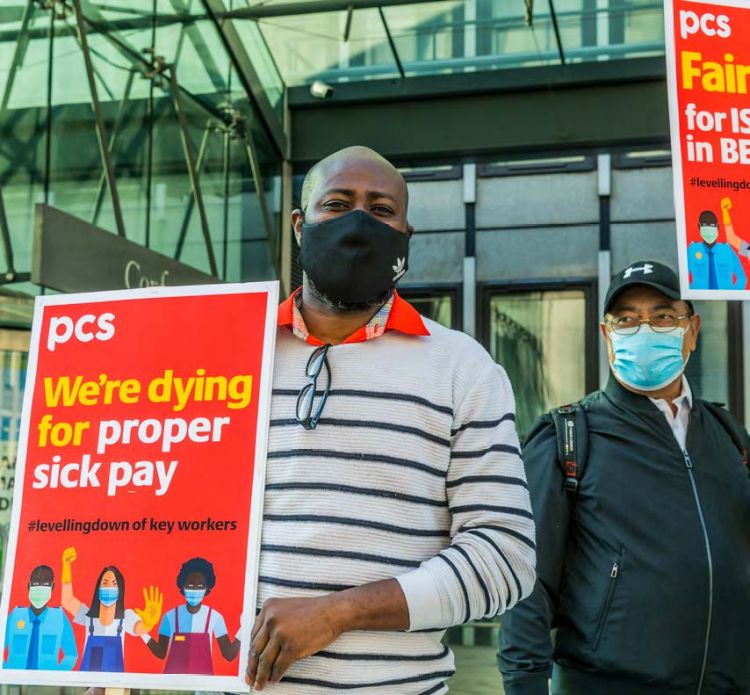 Unionised cleaners subcontracted to government department BEIS picket over safer workplaces and better pay © Guy Bell