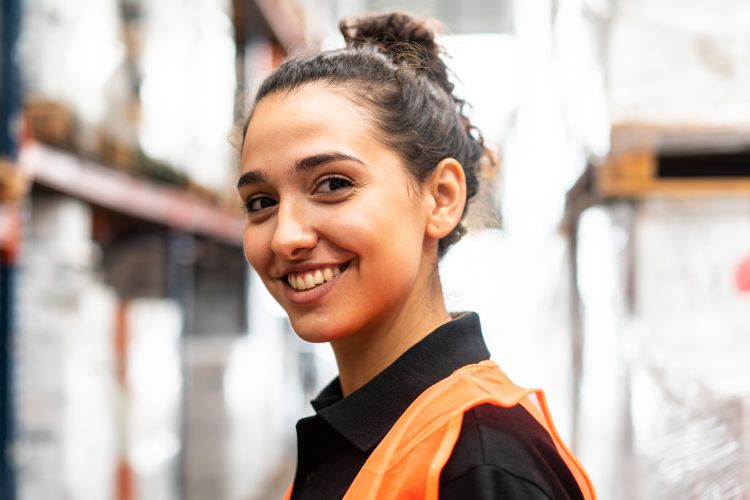 young female worker in a factory