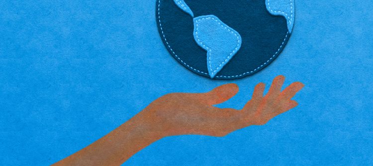 Illustration of a hand holding a globe