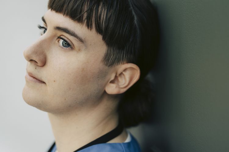Close-up of thoughtful transgender nurse looking away