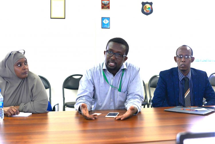 Photograph of Omar Faruk Osman and colleagues