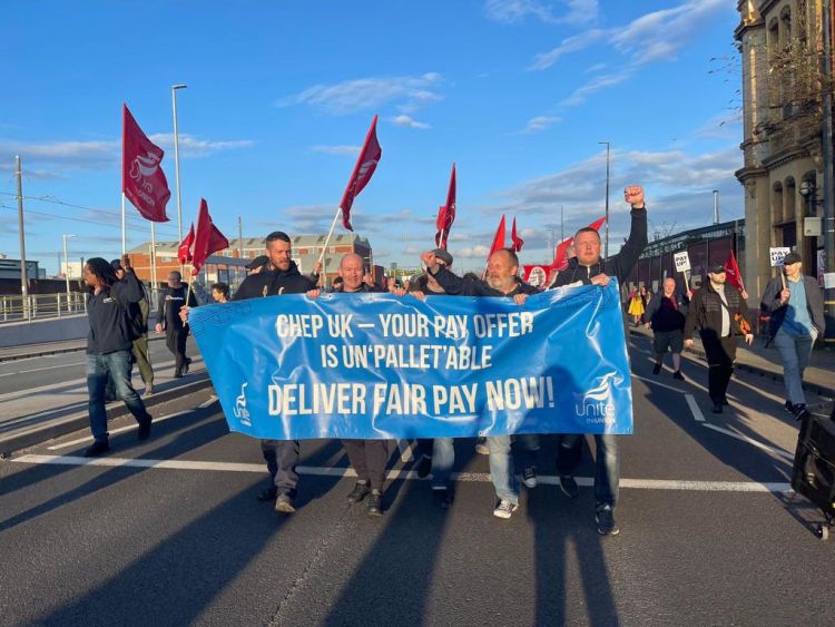 Marching down road