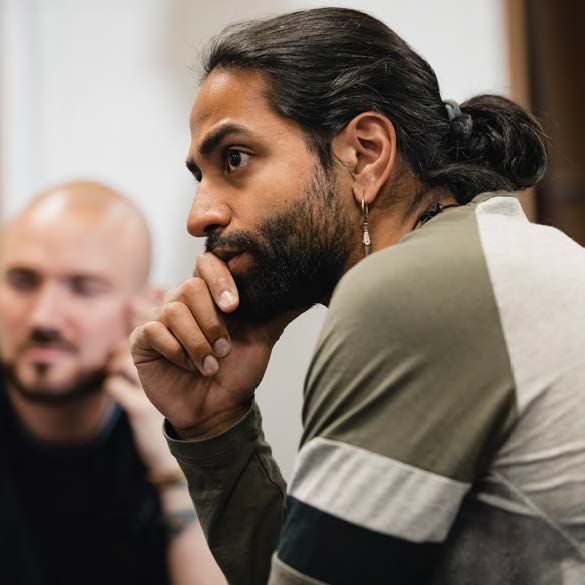 photo: Two men listening