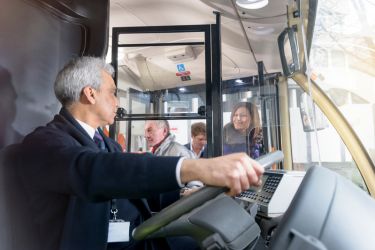 Bus driver and passengers 