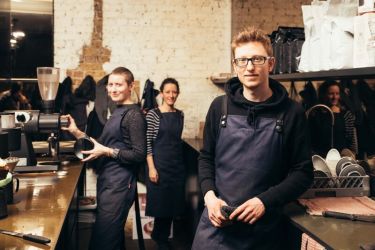 Young workers in a cafe setting 