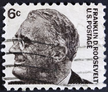 Postage stamp with face of Franklin D Roosevelt
