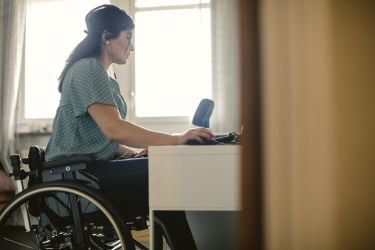 Disabled worker working from home
