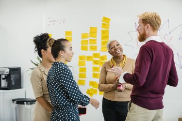 Group of workers talking