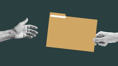 hand passing a document