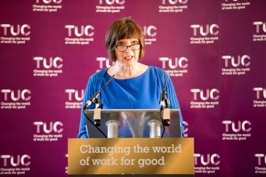 Frances O'Grady speaking at a TUC 150 Congress lecturn