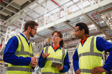 Three workers in hi vis