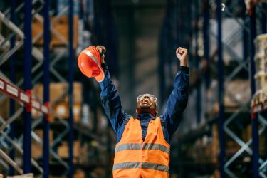 warehouse worker celebrating success