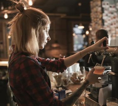 Bar worker at night. Photo: AntGor