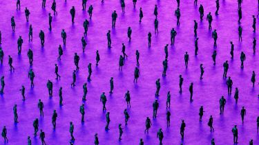 A digitally generated image showcasing a crowd of businesspeople in monochrome silhouettes, walking or standing against a vibrant futuristic neon-lit background
