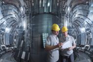 Two workers in a nuclear power plant