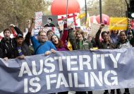 Workers holing a banner at a demonstration