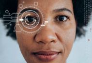 woman of colour with data technology in her eye
