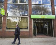 Man walking past job centre