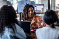 women workers negotiating at work