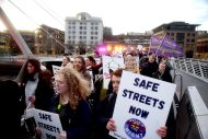 Protesters at Newcastle and Gateshead Reclaim the Night 2026 crossing the Millennium Bridge 