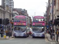 First buses waiting at lights