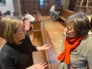 Frances O'Grady speaking to priest at St Aiden’s Community Kitchen 