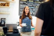 barista serving coffee