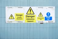 Asbestos hazard sign outside construction site