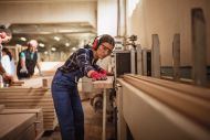 Female carpenter worker in carpentry factory