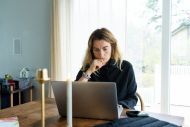 freelancer looking at laptop