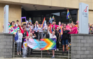 Photo of union members celebrating Pride outside the Unite building in Newcastle