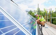 Man fixing solar panel roof 