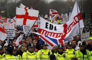 Far-right demonstrators with flags.