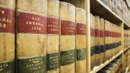 A bookshelf containing legal texts