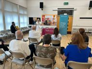 Photo of Julie Boyd (Industrial Benefits Advisor) speaking at the ASCG 10 year celebration event.