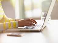 Person typing on a laptop